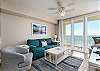 Light and airy views from the living room/balcony area atop the pristine sun-kissed beaches along the Gulf