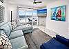 Enjoy a movie or your favorite show in this colorful living room
