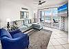 The vibrant Living Room has a remarkable 4th floor view of the Gulf.