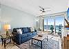 The vibrant Living Room has a remarkable 4th floor view of the Gulf.
