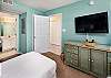 Additional Guest bedroom with 2 twin size beds includes direct access to the third bathroom.