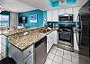 View of the kitchen with all stainless steel appliances