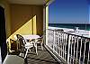 Balcony seating for four is available for those perfect Emerald Coast sunsets.