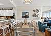 The dinning room table located next to the kitchen for your convenience