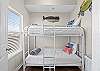 Bunk room featuring a twin set of bunk beds