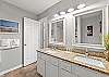 Double vanities in this bath located right off the master bedroom