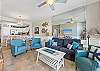 Open concept living room with plenty of seating and a sofa sleeper
