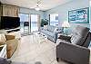 Windows abound in this gulf front 2BR/2BA condo.  Just in case the view of the Emerald Coast Beaches is not enough to distract those die hard fans, there is a flat screen television in the living room 