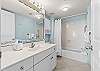Spacious bathroom with shower/tub combo