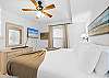 Additional views of the master bedroom featuring a nicely sized flat screen for all of your entertainment needs.