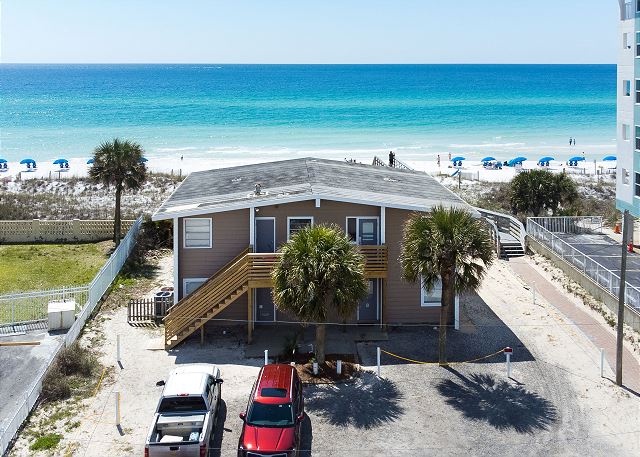 Just steps away from the boardwalk that takes you to beach!