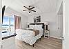 Wake up to the views and sounds of the Gulf! This master features a king size bed and shares a bathroom with a shower/tub combo with Bedroom #4.