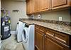 A spacious laundry room to get those bathing suits cleaned and ready for the next day! 