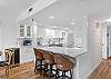 Extra seating at the kitchen island creates the perfect spot to connect and unwind.