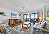 Take in breathtaking ocean views from this spacious and beautifully appointed living area, featuring stylish coastal décor, plush seating, and the perfect setting to relax and unwind.