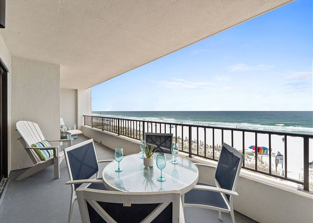 Balcony View: enjoy a beverage while soaking in breathtaking beach vistas and ocean breeze!