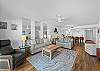 Relax in comfort in this spacious gathering space, thoughtfully designed with chic coastal accents and plush seating for the whole family.