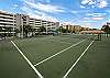 Play a match on the elevated tennis court with open views.
