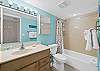 Featuring a shower/tub combo.