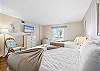 The guest bedroom also features a flat screen TV and mirrored closet doors and LOTS OF SPACE.