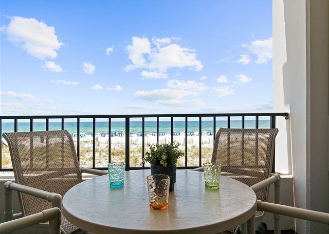 The balcony, which can be accessed from the living room and the master bedroom, is quite large for a 2BR unit - about 30 feet long. It also has seating out here for up to 8 guests!