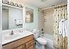 Notice the extra space on the sink & the tub / shower combo!