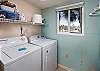 Located just beyond the kitchen, a full size washer and dryer are available for your convenience.