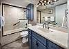 Features a tub/shower combo