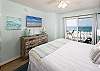 A television is also provided in this master bedroom