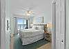 Master bedroom has a king size bed and access to the private beach front balcony.
