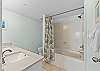 Featuring a shower/tub combo