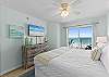 A television is also provided in this master bedroom