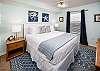 Guest bedroom has a king size bed and very comfortable furnishings