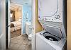 WIth entry to the bedroom as well as a sttackable washer and dryer for your laundry needs.