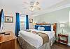The bedroom is simple, cozy, and peaceful—perfect for recharging after a day in the sun.