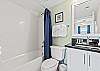 Featuring a tub/shower combo