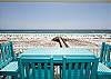 Wooden boardwalk pictured is the private walkway to the water and your complimentary beach service setup.