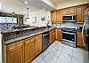 Captivating fully equipped kitchen complete with stainless steel appliances