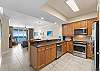 Captivating fully equipped kitchen complete with stainless steel appliances