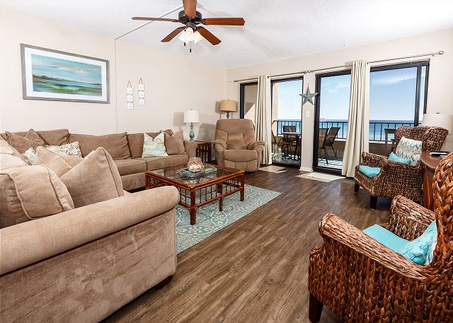 Spacious Gulf-front living room looks warm and inviting!