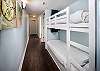 bunks boast fun bright comforters and each bunk has its own LED TV.