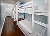 Each bunk has a TV.