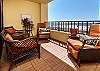 Tile and comfortable furnishings on the balcony, makes relaxing all the more enjoyable!