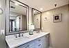 Master bath view with his and her vanity sinks; perfect for a quick clean-up before a night on the town!