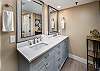 Master bath view with his and her vanity sinks; perfect for a quick clean-up before a night on the town!