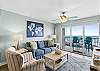The sofa is a queen size sleeper. Comfortable seating in this 3rd floor 2 bedroom condo makes for a perfect home away from home atmosphere.