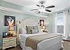 Guest bedroom features a queen size bed and great furnishings with lots of storage space for your personal belongings.