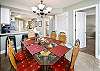 Great open floor plan and a nice size dining room table with seating for 6 guests.
