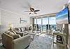 Living Room: Bright and airy space with stunning beach views and comfy furnishings for relaxation
