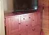 TV & dresser in master bedroom.